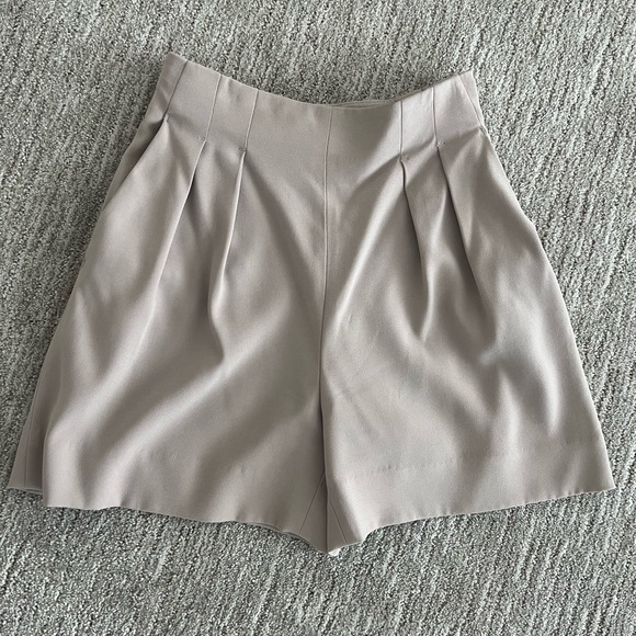 Babaton Pants - High rise pleated shorts Aritzia